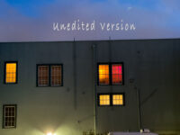 Unedited version of Windows In Deep Colors by Fred Gerendasy Photography – original night photograph of lit windows and bold hues