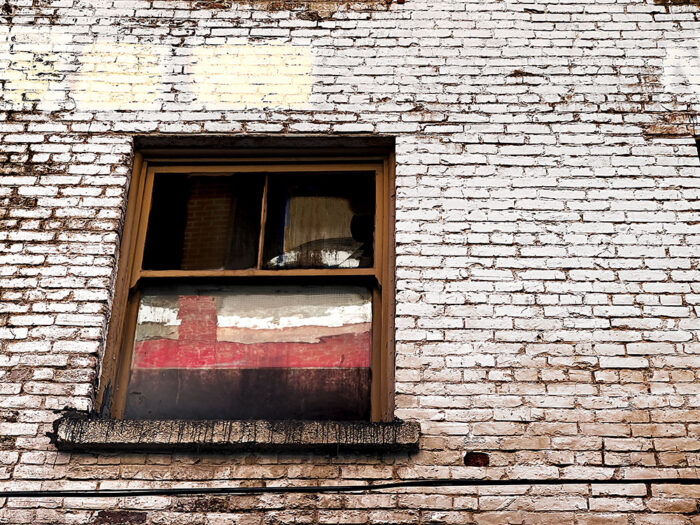 Window and Brick archival pigment print by Fred Gerendasy Photography – fine art photo capturing mystery and urban decay