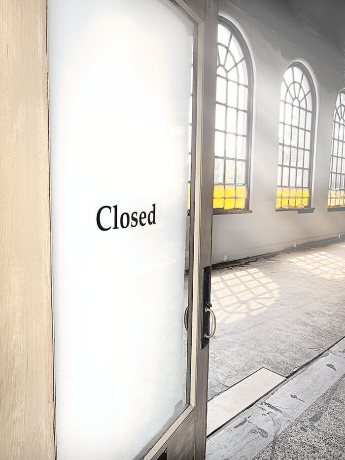 Closed archival pigment print by Fred Gerendasy Photography – slightly open door with light filtering into an empty room