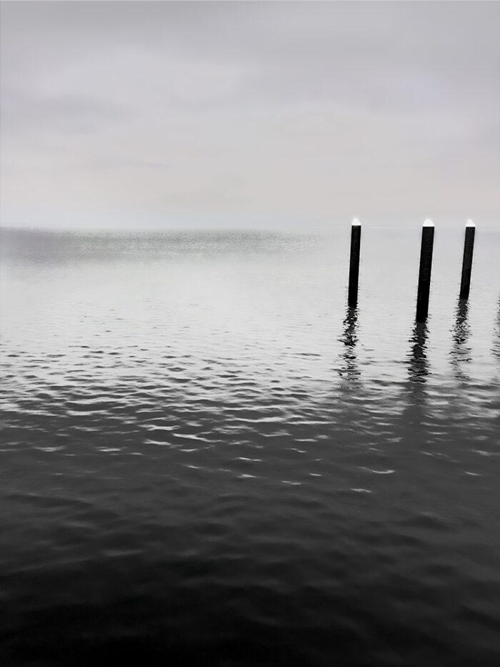 Three Piers archival pigment print by Fred Gerendasy Photography – fine art landscape capturing calm, stillness, and the oncoming storm