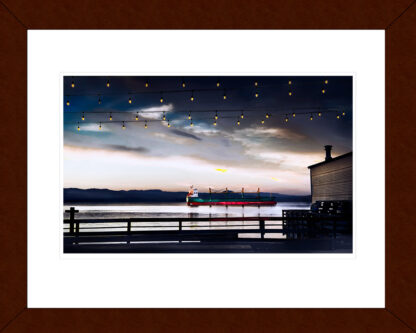 Framed: Ship At Sunset archival pigment print by Fred Gerendasy Photography – fine art seascape featuring a tranquil ship against a glowing horizon