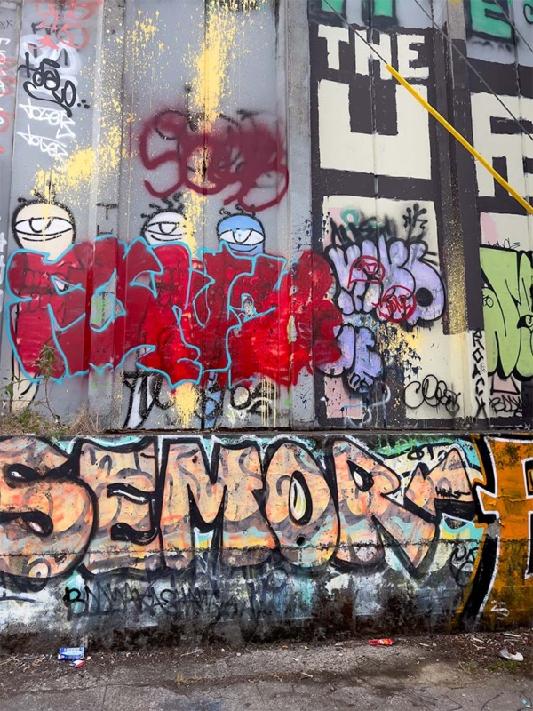 Colorful painted graffiti on cement wall in portland