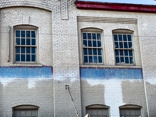 Colorful painted side of brick building