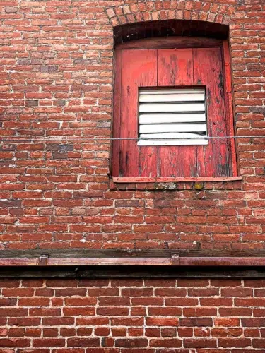 Red Brick Wall - A Wire Runs Through